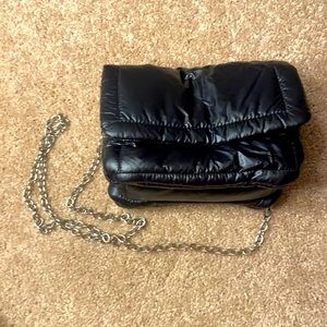 Black handbag with chain